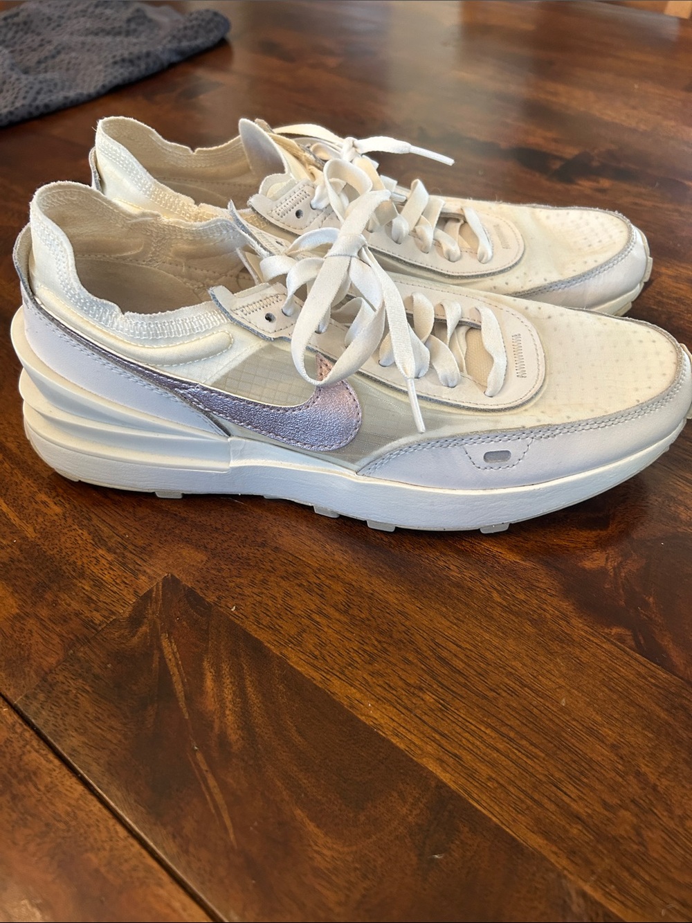 Nike Women’s White Sneakers with Iridescent Swoosh Accent